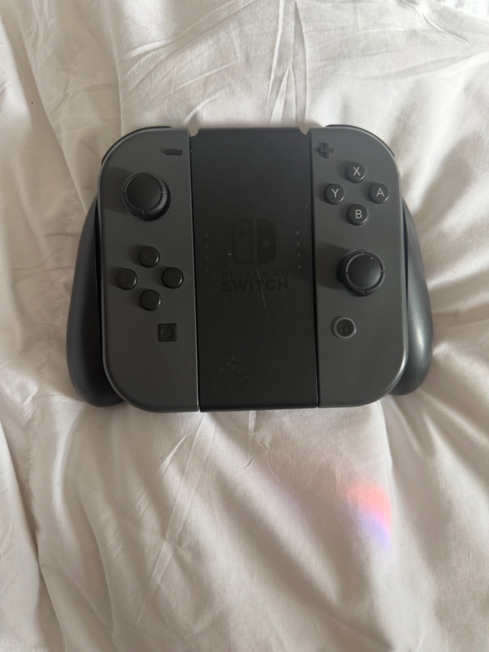 Nintendo Switch Comfort Grip & Joy-Con controllers in Black